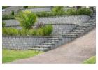 Expert Retaining Wall Installation for Lasting Strength and Style