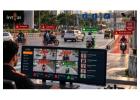 AI-Based Detection of Helmet, Triple Riding and Wrong-Way Driving Violations